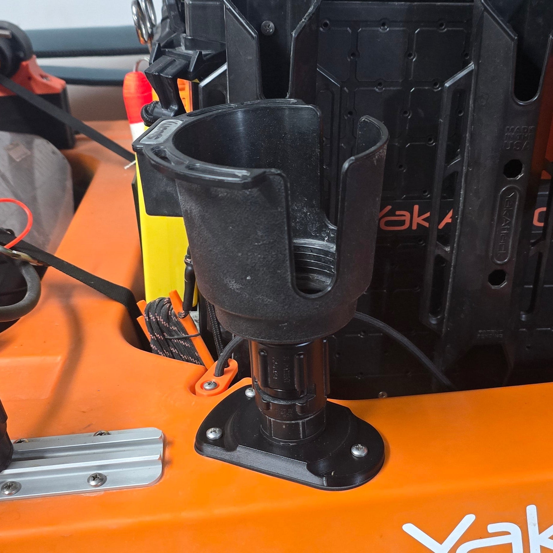 Cup holder mounted on stud plate