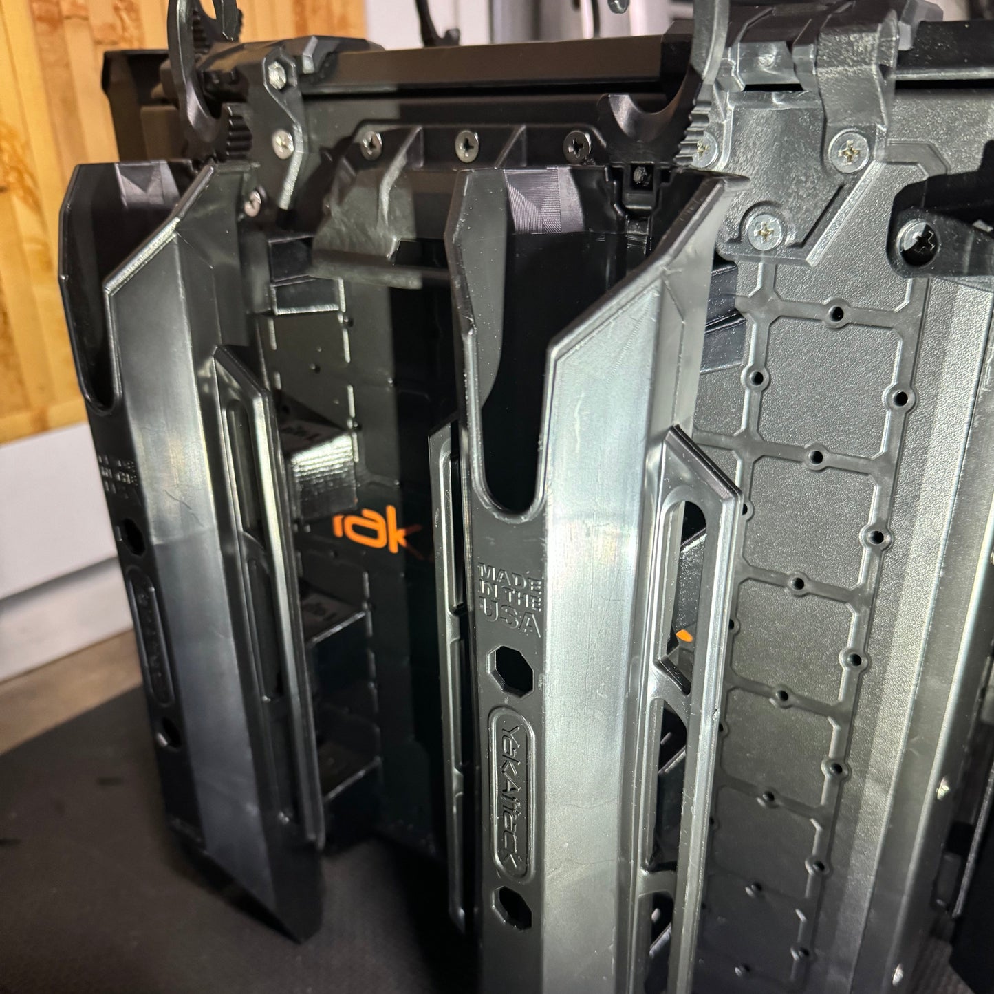 Photo of a pair of rod holders mounted with spacers on the back of a blackpak pro