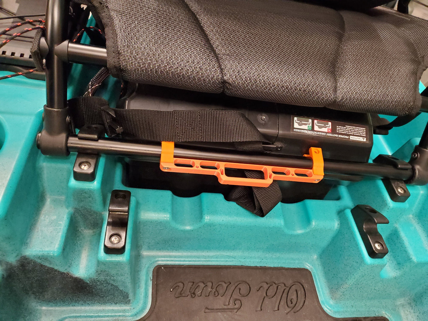 Photo of the clamp on tool holder mounted on a seat rail