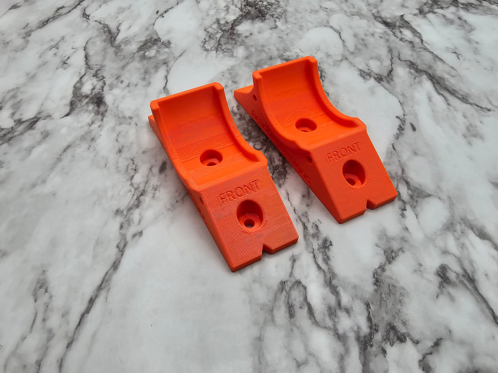 Image of older design seat risers