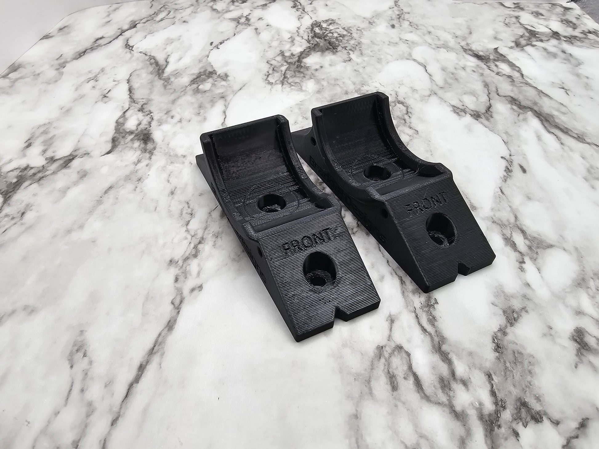 Image of older design seat risers