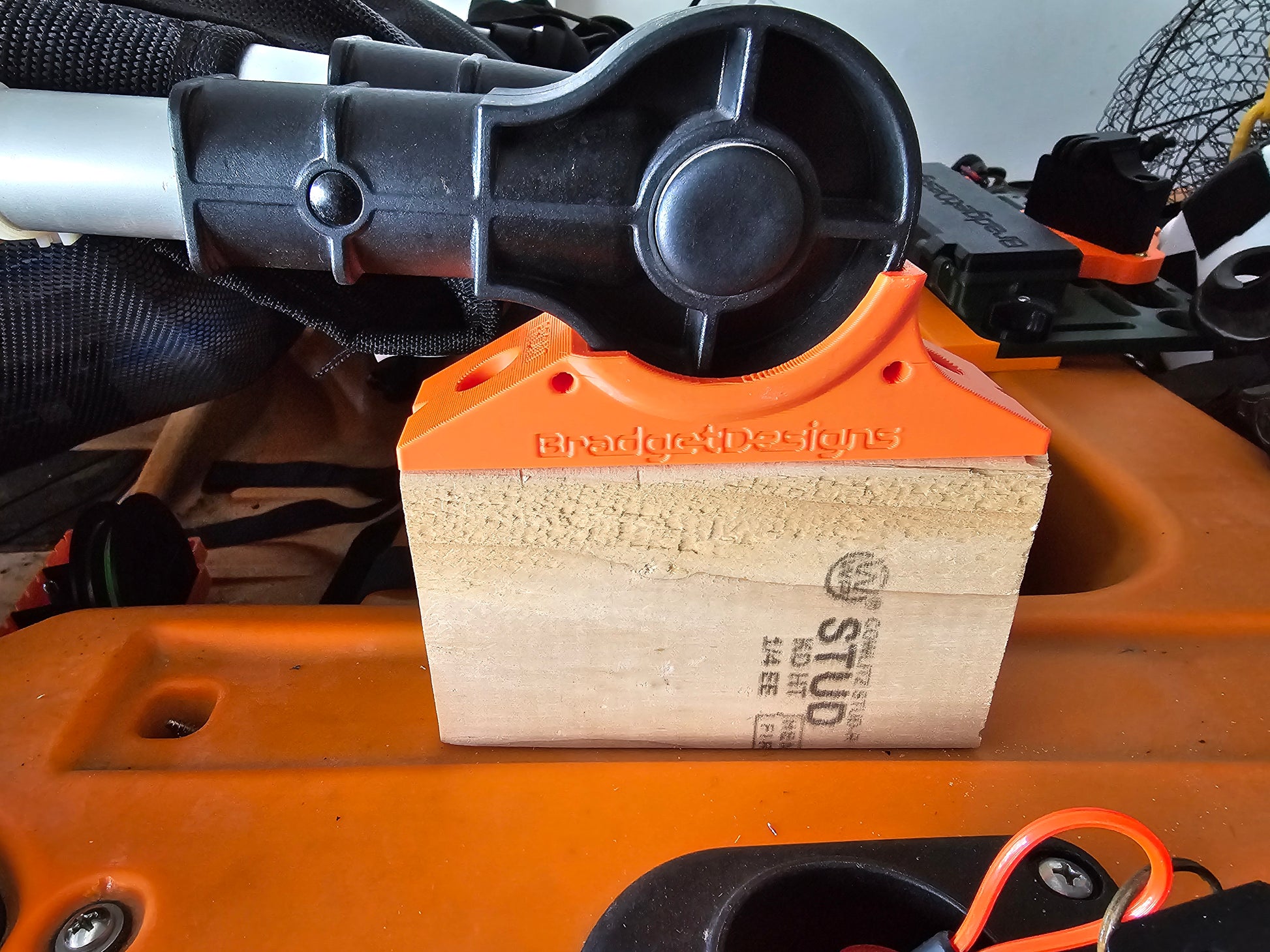 Image of older design seat riser and spacers on kayak