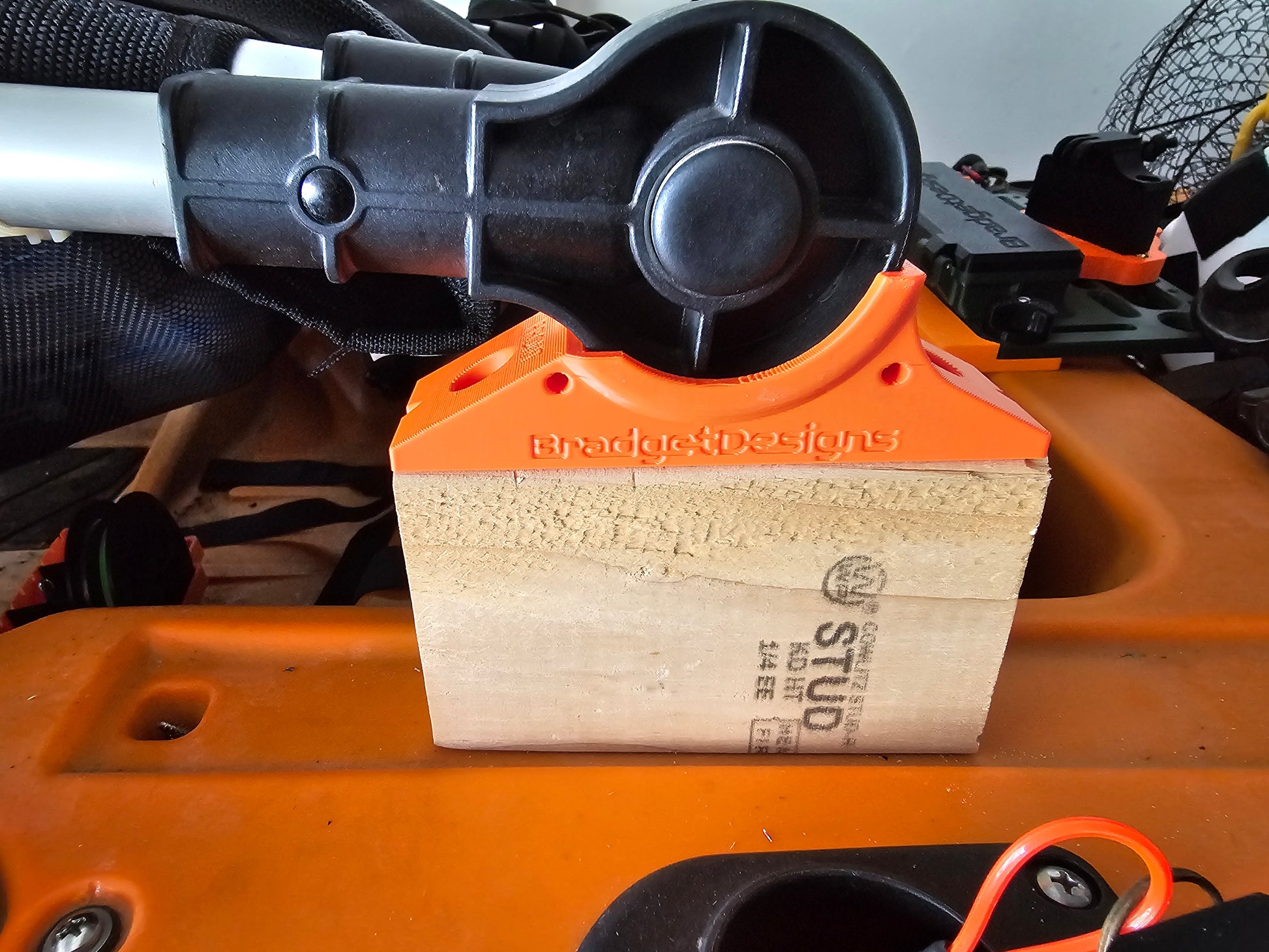 Image of older design seat riser and spacers on kayak