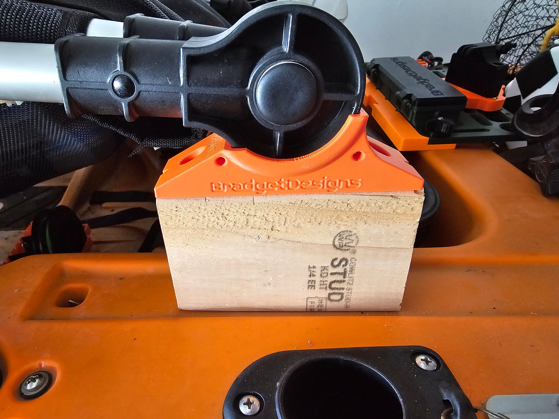 Image of older design seat riser and spacers on kayak
