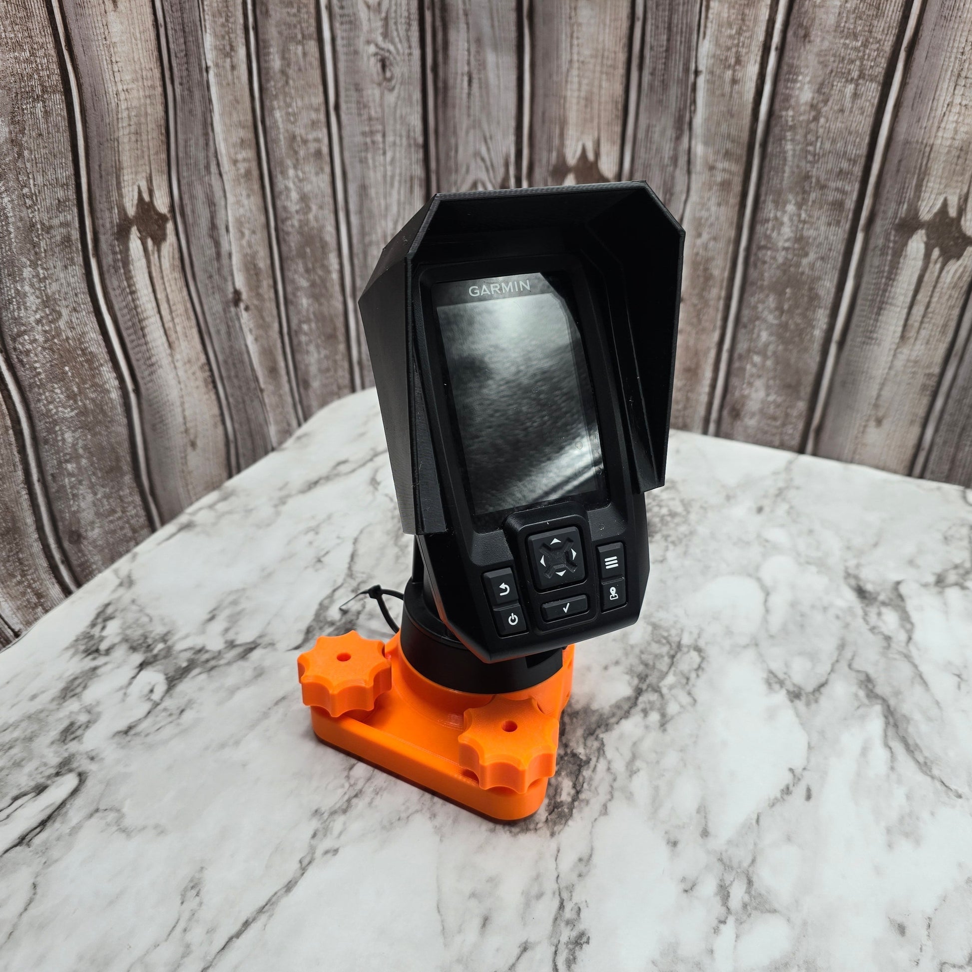 Photo of a Garmin Striker mounted on the rail mount Striker mount