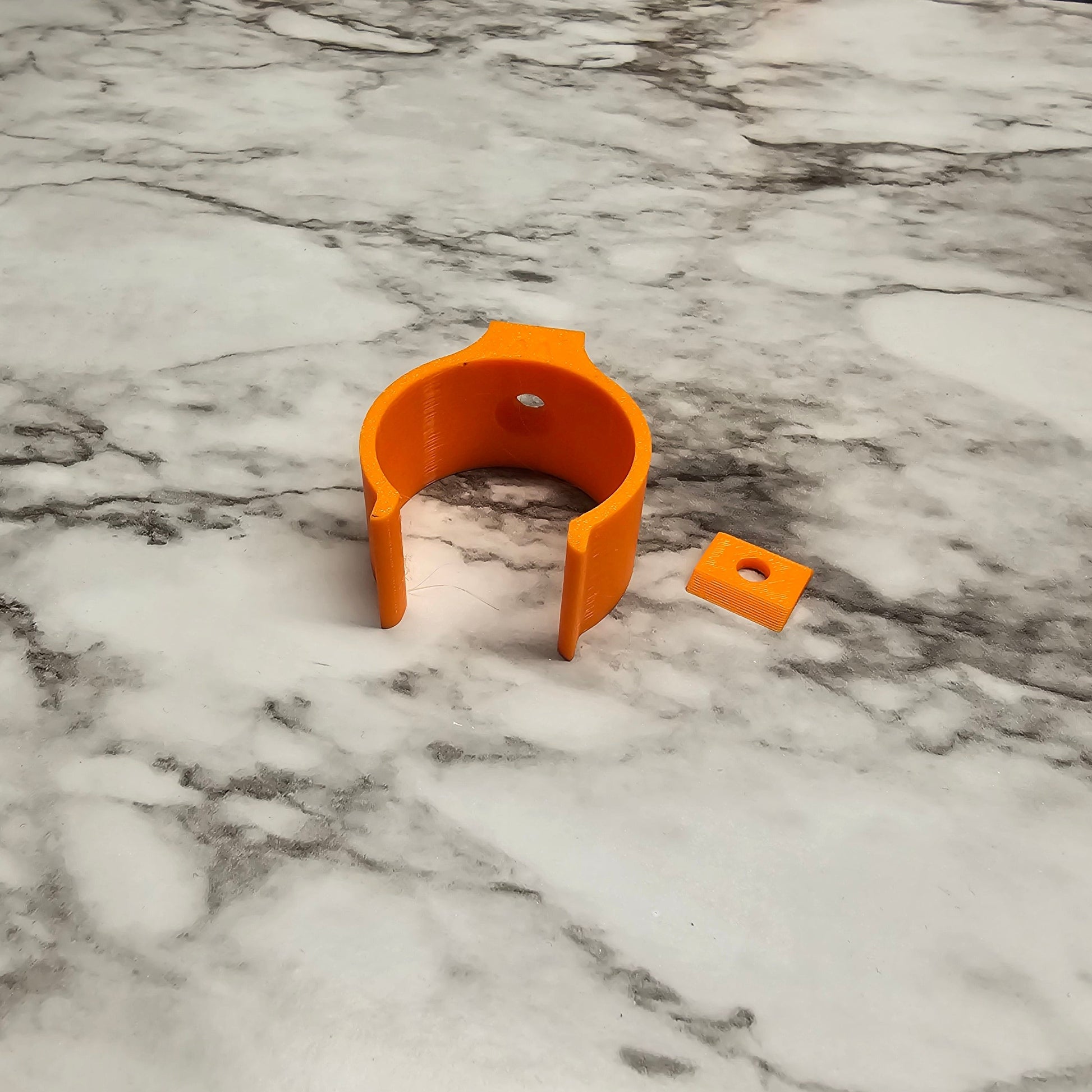Photo of a can clip and tab