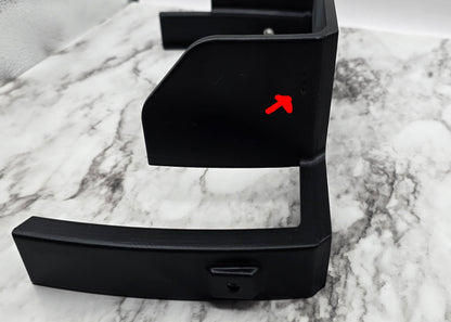 Black electronic device on a marble surface