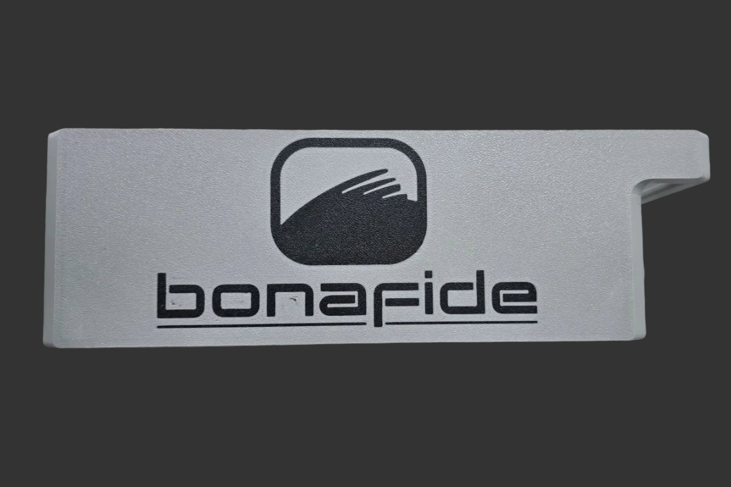 Gray sunshade with 'bonafide' logo on a marble surface