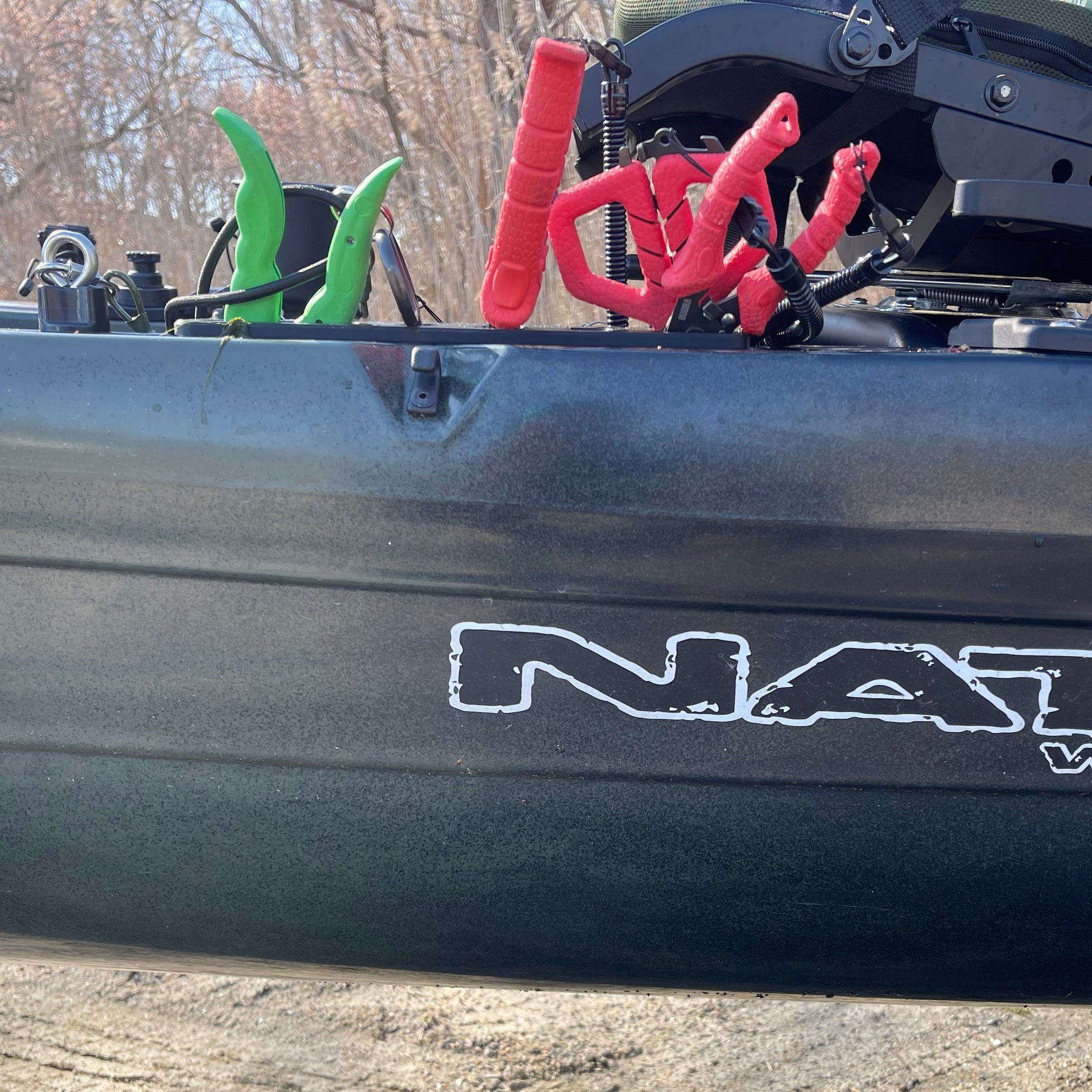 Photo of the side of the kayak with tool holder installed.