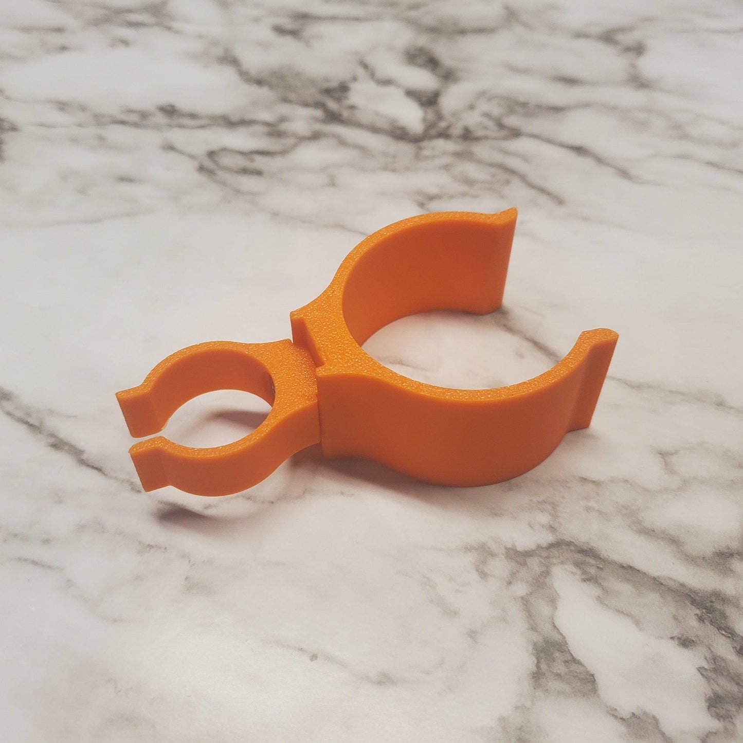 Photo of the sunscreen/bug spray can holder
