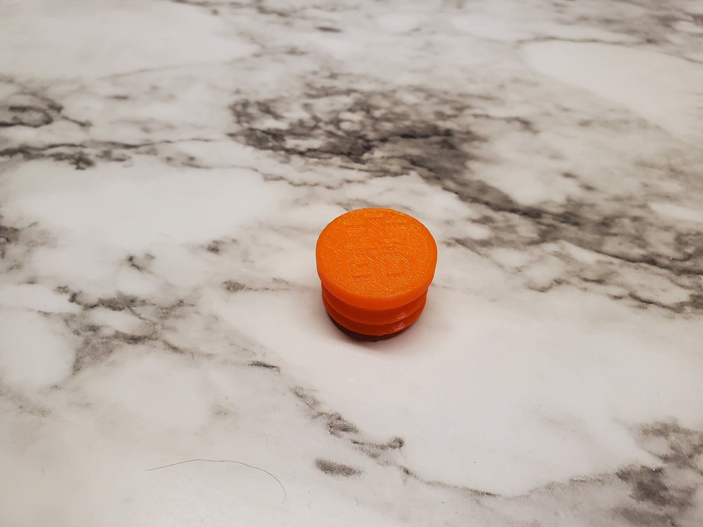 photo of orange flexible end cap