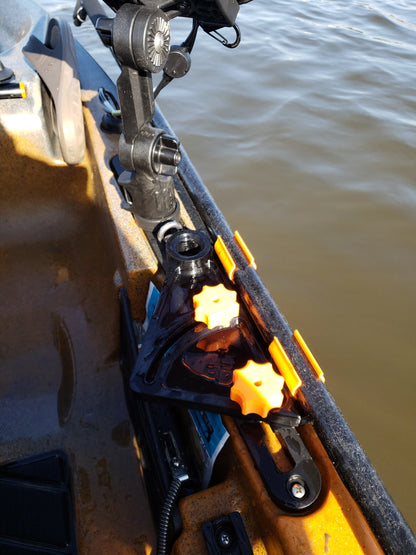 Image of the Stake-n-Stow on a kayak holding a pole